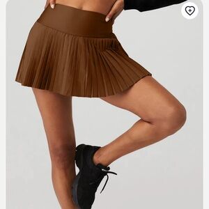 Alo grand slam tennis skirt in cinnamon brown.